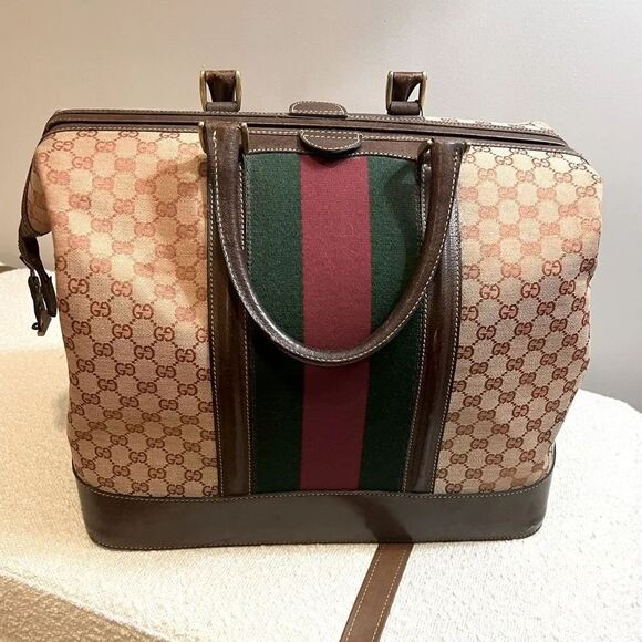 Gucci Handbags - VINTAGE Gucci weekender travel bag, canvas and leather